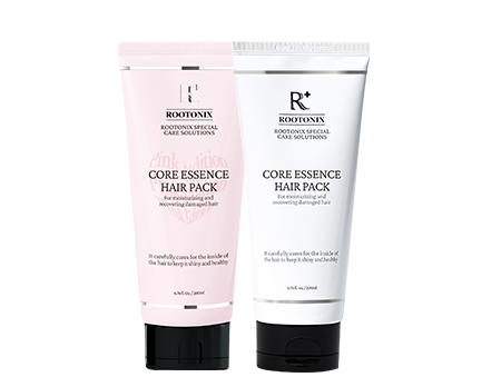 Rootonix R+ Core Essence Hair Pack duo with Pink Irish Rose Musk and White Amber Vanilla scents in their respective colored tubes for targeted hair treatment